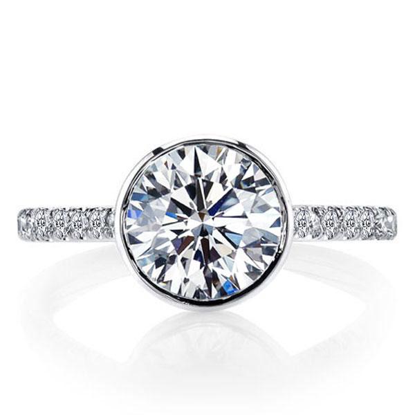

Italo Classic Bezel Created White Sapphire Engagement Ring