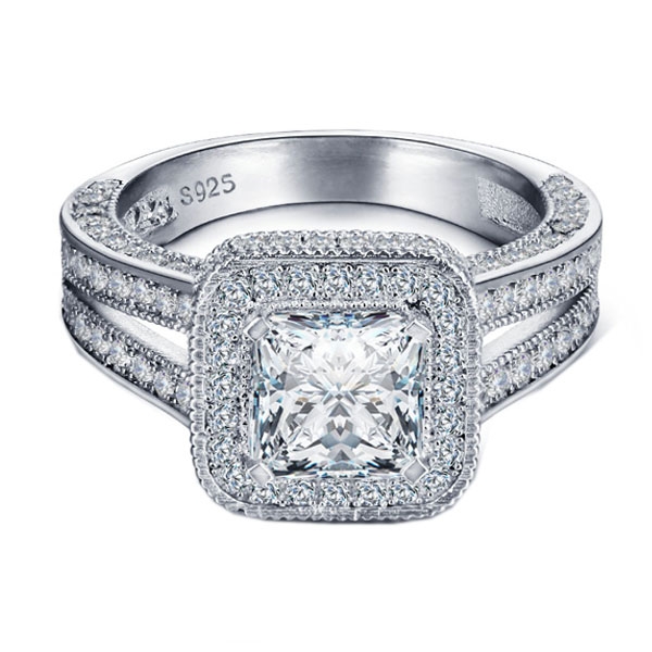 

Italo Halo Spilt-Shank White Sapphire Engagement Ring