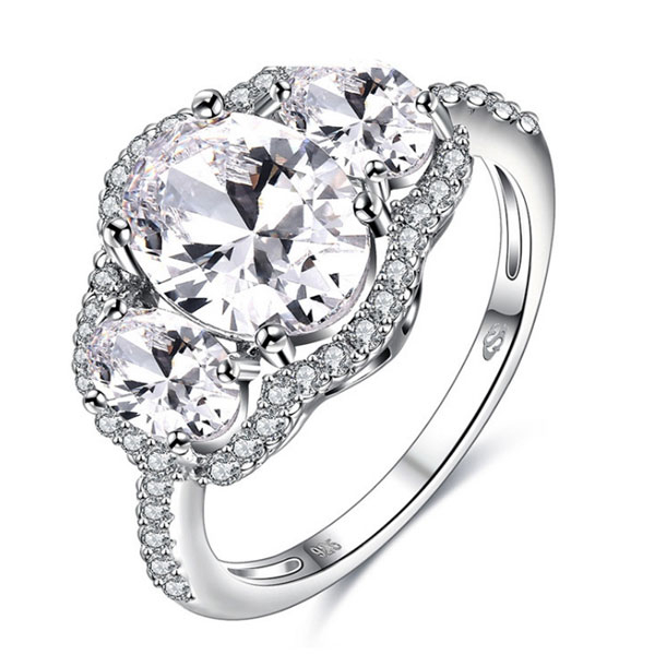 

Italo Three Stone Created White Sapphire Engagement Ring
