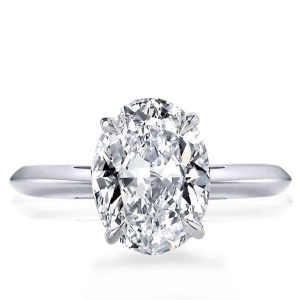 

Italo Oval Cut Solitaire Engagement Ring With Knife Edge Shank, White