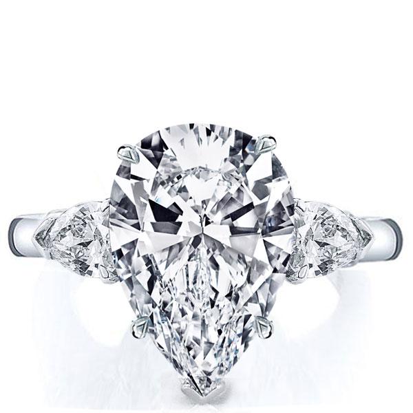 

Italo Three Stone Pear Created White Sapphire Engagement Ring