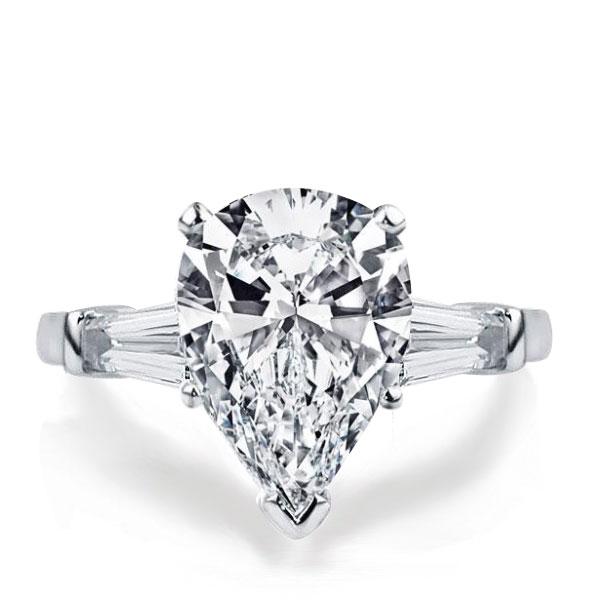 

Italo Three Stone Pear Created White Sapphire Engagement Ring