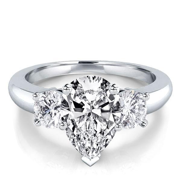 

Italo Three Stone Pear Created White Sapphire Engagement Ring