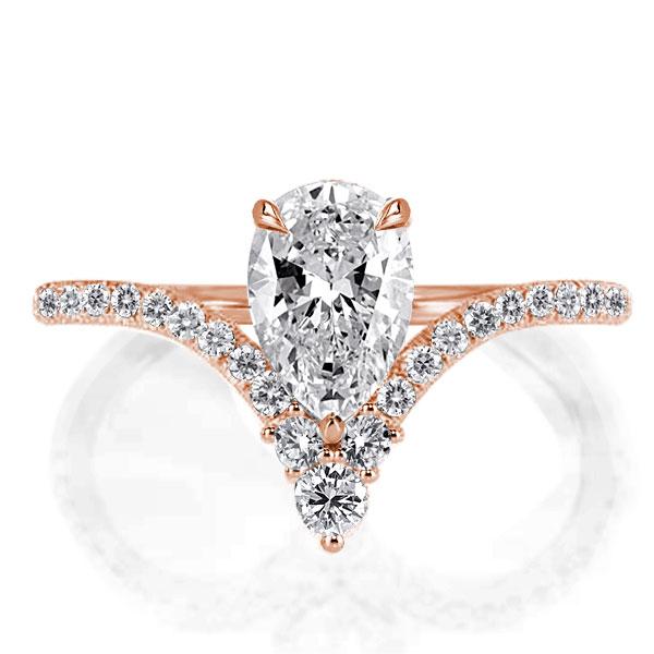 

Rose Gold V-design Pear Created White Sapphire Engagement Ring