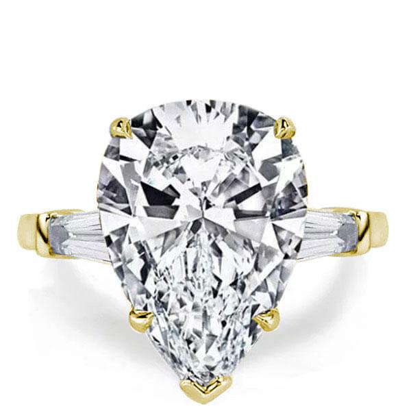 

Golden Three Stone Pear Created White Sapphire Engagement Ring