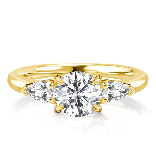 

Three Stone Round & Pear Cut Golden Engagement Ring, White