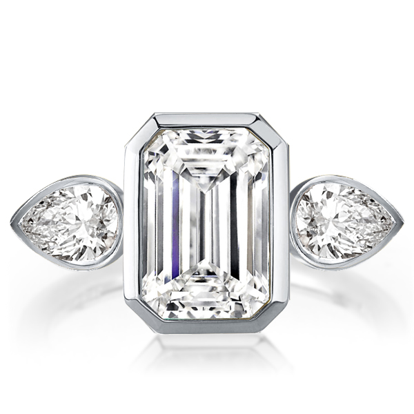 

Italo Three Stone Emerald Cut White Sapphire Engagement Ring