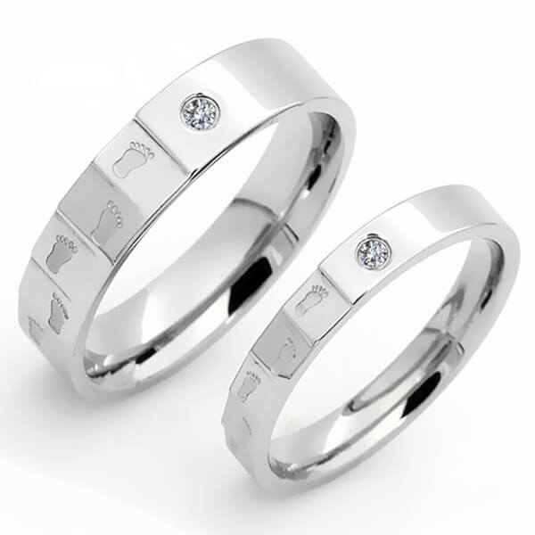 

Italo Footprint Polished Titanium Steel Couple Rings, White