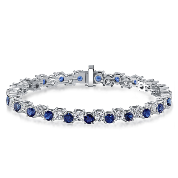 

Italo White & Blue Sapphire Offset Bracelets For Wedding