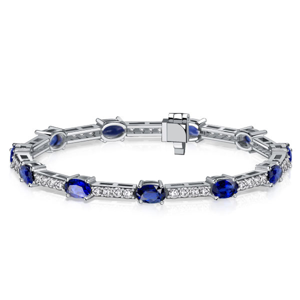 

Italo Oval Cut Blue Sapphire Tennis Bracelets In Sterling Silver, White