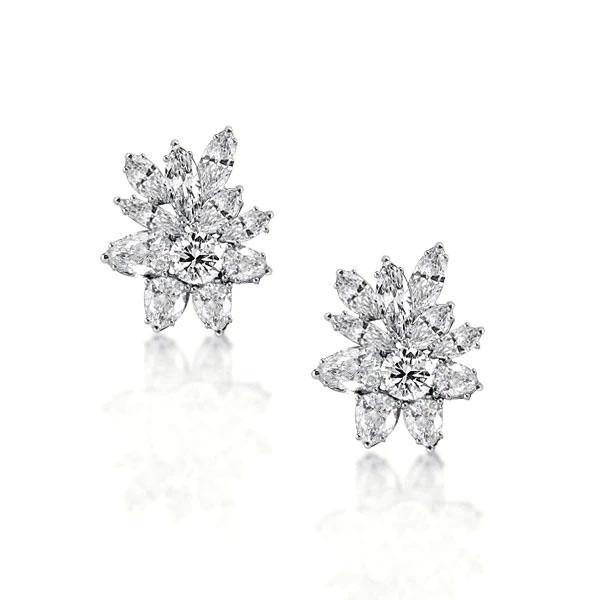 

Round & Marquise Cut White Sapphire Stud Earrings