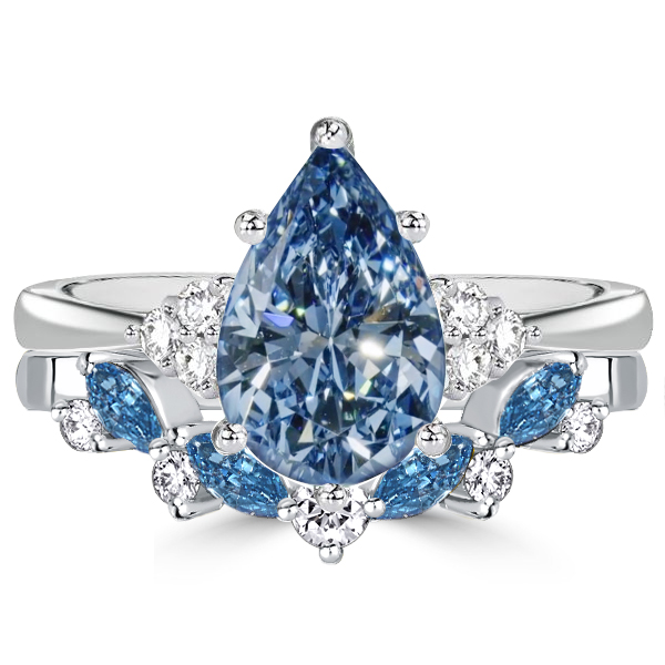 

Italo Pear Shaped Blue Topaz Wedding Rings Bridal Set, White