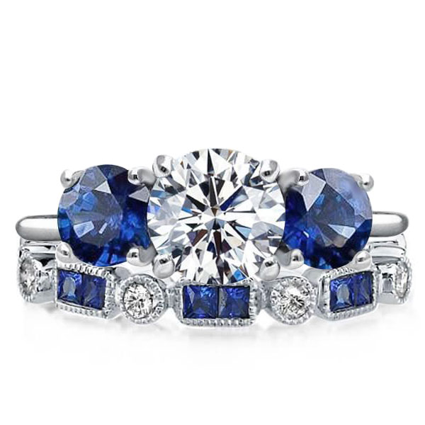 

Three Stone Round Cut White & Blue Sapphire Birdal Set