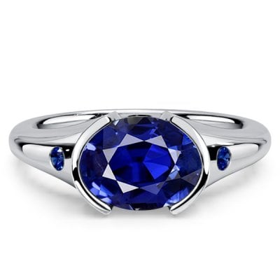 Italo Half-bezel Oval Cut Blue Sapphire Three Stone Engagement Ring For Women