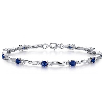 Italo Three Stone Oval Cut Blue Sapphire Tennis Bracelet For Women