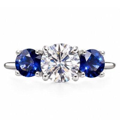 Italo Three Stone Moissanite Engagement Ring with Blue Sapphire Accents