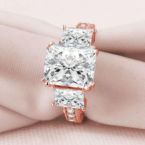 rose gold emerald engagement rings