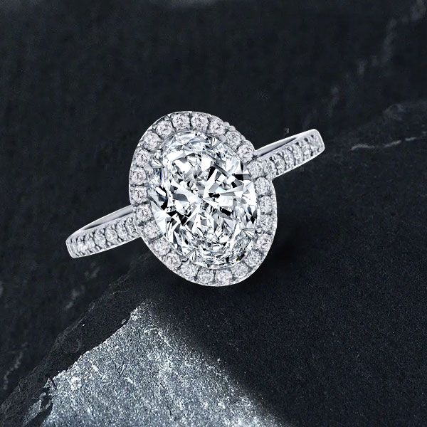 Round Shape 14-Karat Single Row Channel Set Diamond Engagement Ring with  Tension Setting | Angelucci Jewelry
