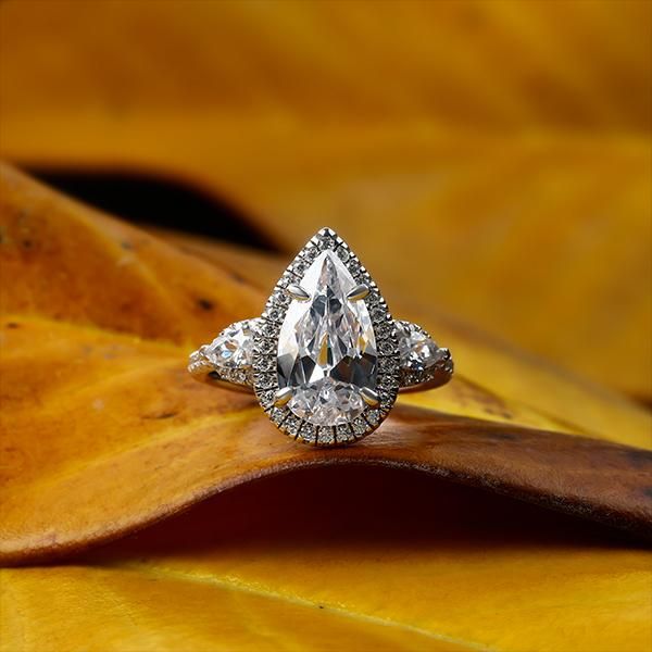 Pear Halo Three Stone Engagement Ring