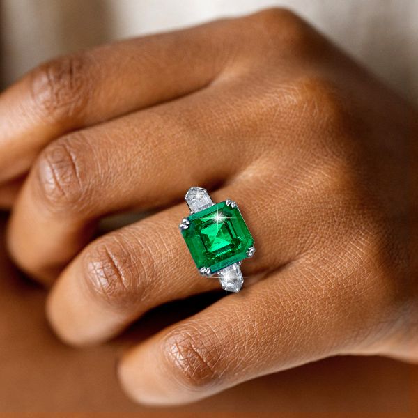 Oval Cut Emerald Ring With Diamond Halo at Diamond and Gol