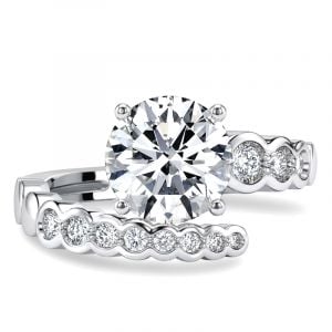 Italo Spiral Bezel Setting Bypass Round Cut Unique Engagement Ring