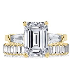 Italo Golden Three Stone Emerald Cut Engagement Rings Sets
