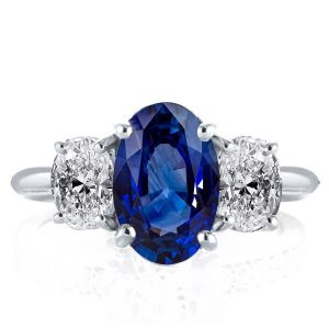 Italo Three Stone Oval Cut Blue Sapphire Engagement Ring