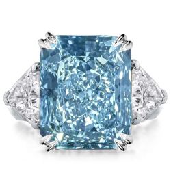 Three Stone Radiant Cut Created Blue Topaz Engagement Ring