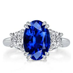 Italo Three Stone Oval Cut Blue Sapphire Engagement Ring