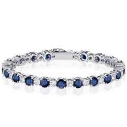 Round Cut White & Blue Sapphire Tennis Bracelet In Silver