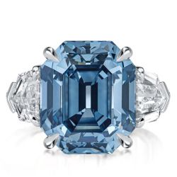 Blue Topaz Three Stone Emerald Cut Engagement Ring In Silver