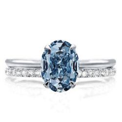 Oval Cut Blue Topaz Solitaire Engagement Ring Set