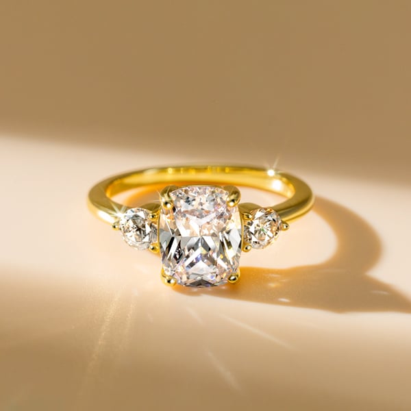 Italo Three Stone Cushion Cut Engagement Rings
