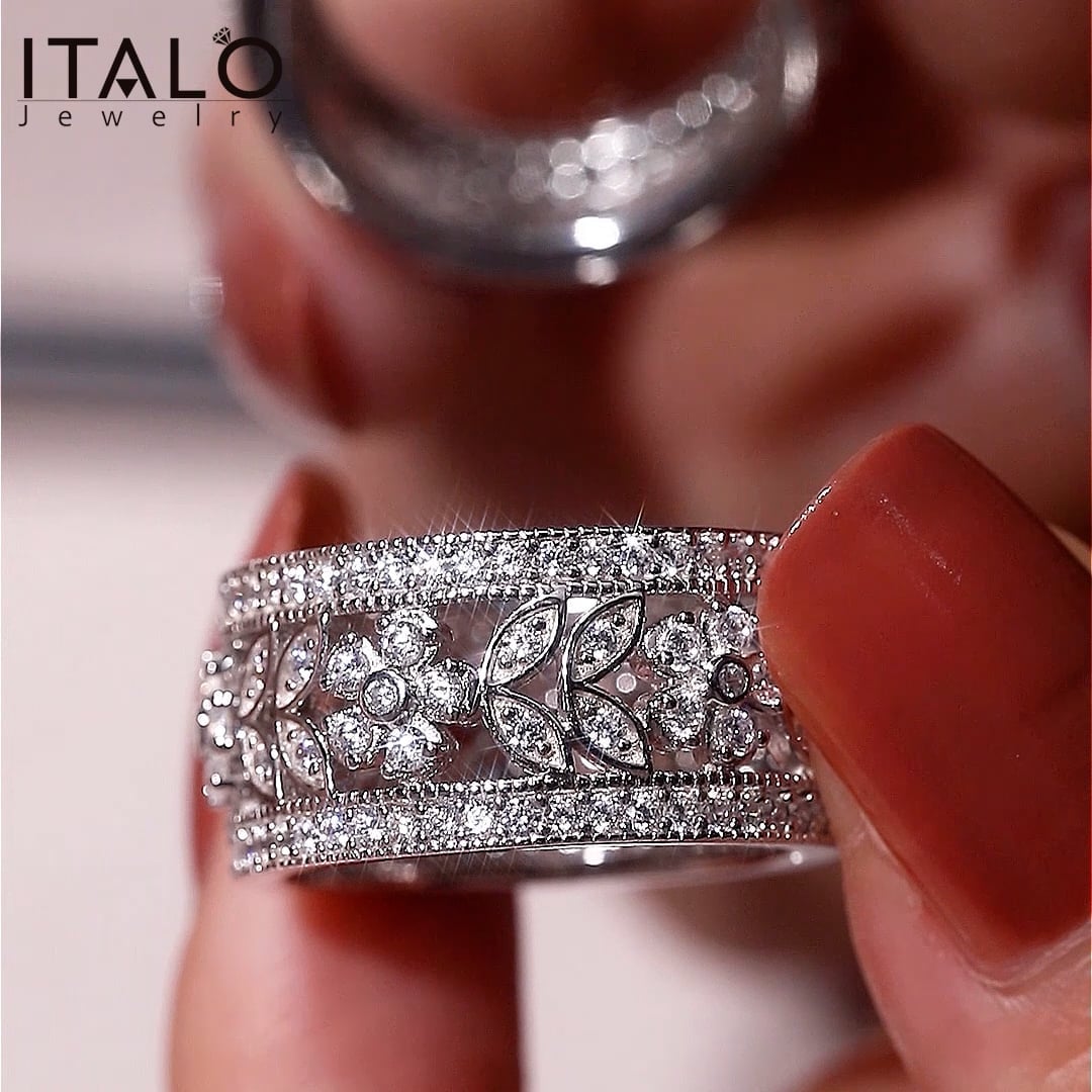 Italo White Sapphire Floral Eternity Band In Sterling Silver