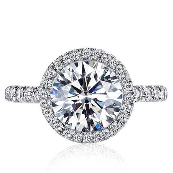 Why Are Round Engagement Rings with Halo a Timeless Choice?