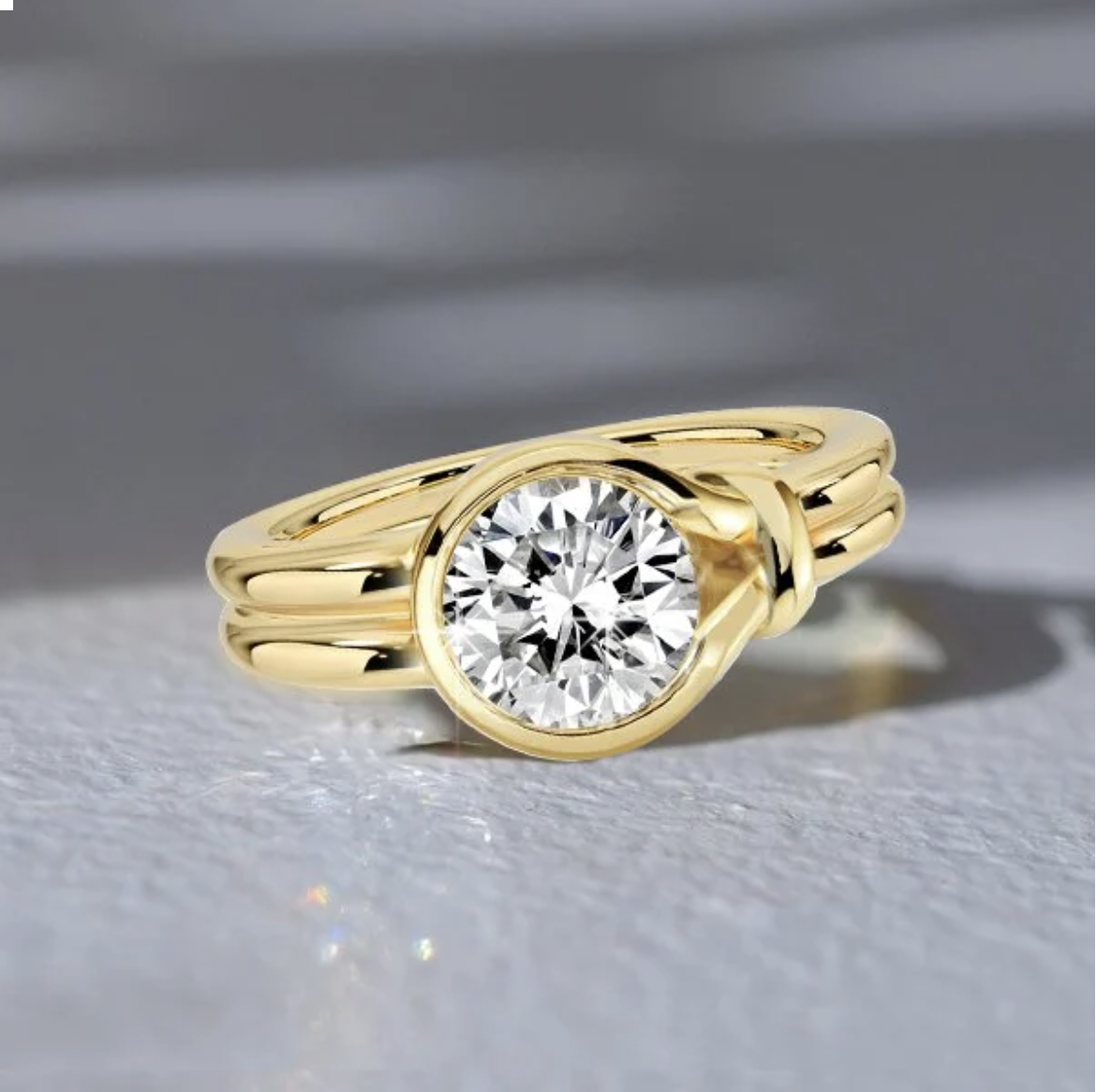Why Is a Gold Bezel Set Engagement Ring the Perfect Choice for Timeless Love?