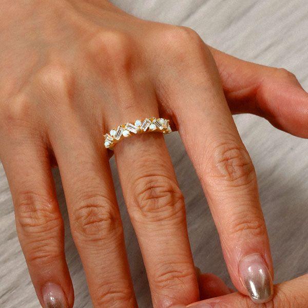 Why Do Couples Love the Iridescent Glow of Vintage Opal Wedding Rings?