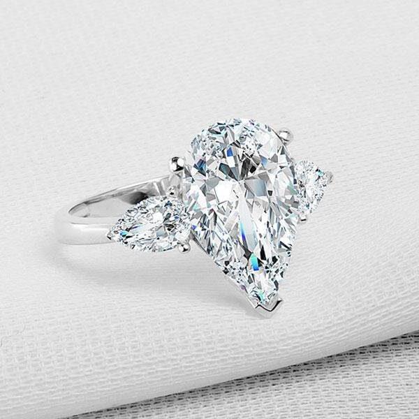 Pear Halo Engagement Ring With Fruitful Flare