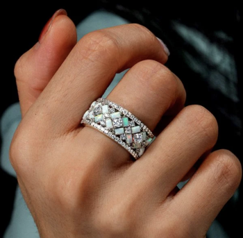 Why Is an Opal Wedding Band Considered a Symbol of Love and Creativity?